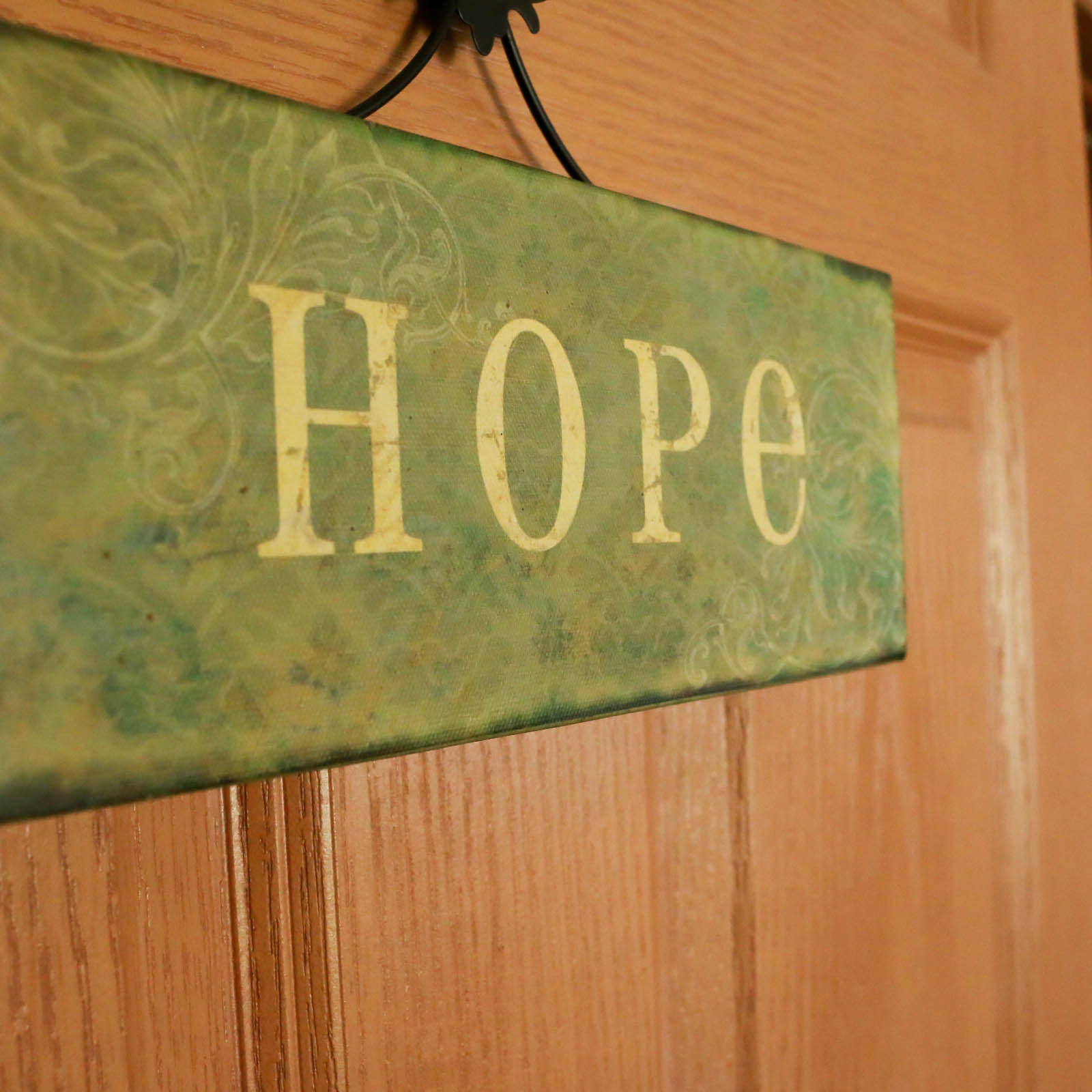 "Hope" sign hung on an office door in Waterloo location.